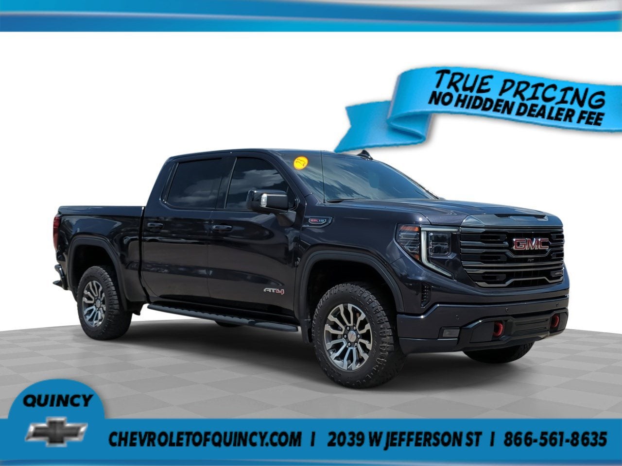 2023 GMC Sierra 1500 AT4 in Titanium Rush Metallic — front three-quarter view